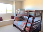 The 2nd guest suite has a twin over double bunk bed, perfect for the kids
